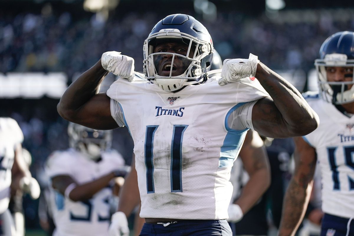 Tennessee Titans wide receiver A.J. Brown celebrates after scoring a touchdown against the Oakland Raiders during the second quarter at Oakland Coliseum