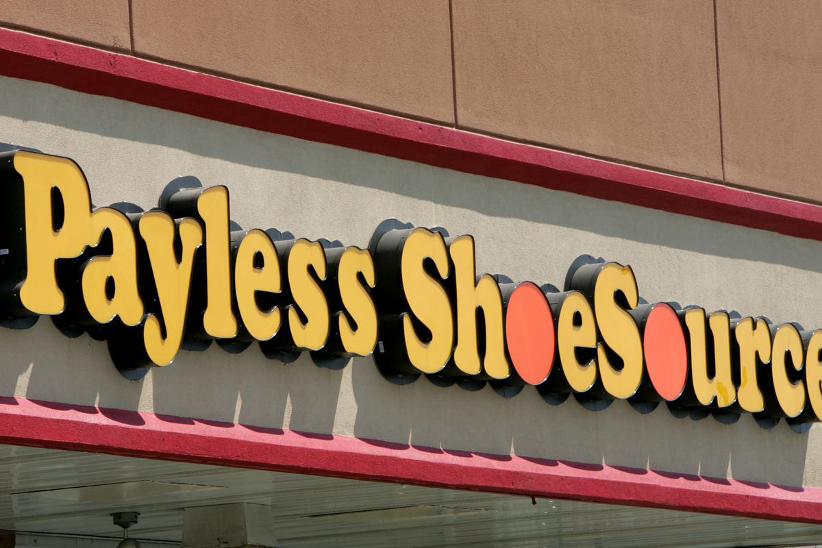 FILE- This Aug. 23, 2006, file photo shows a Payless store front is seen in Philadelphia. Paylesss ShoeSource is shuttering all of its 2,100 remaining stores in the U.S. and Puerto Rico, joining a list of iconic names like Toys R Us and Bon-Ton that have 