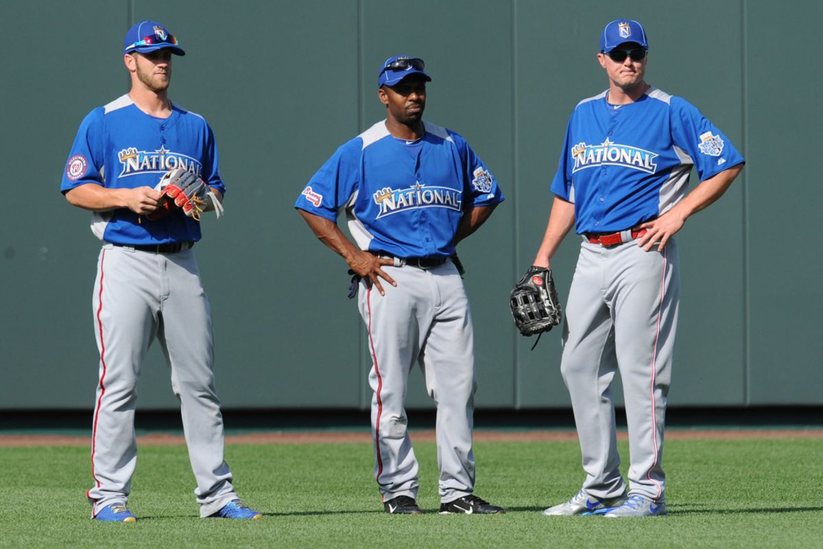 An artist's rendering of what it would look like if Bruce Harper, Michael Bourn and Jay Bruce were all traded to the Royals. Accurately, they don't seem happy.