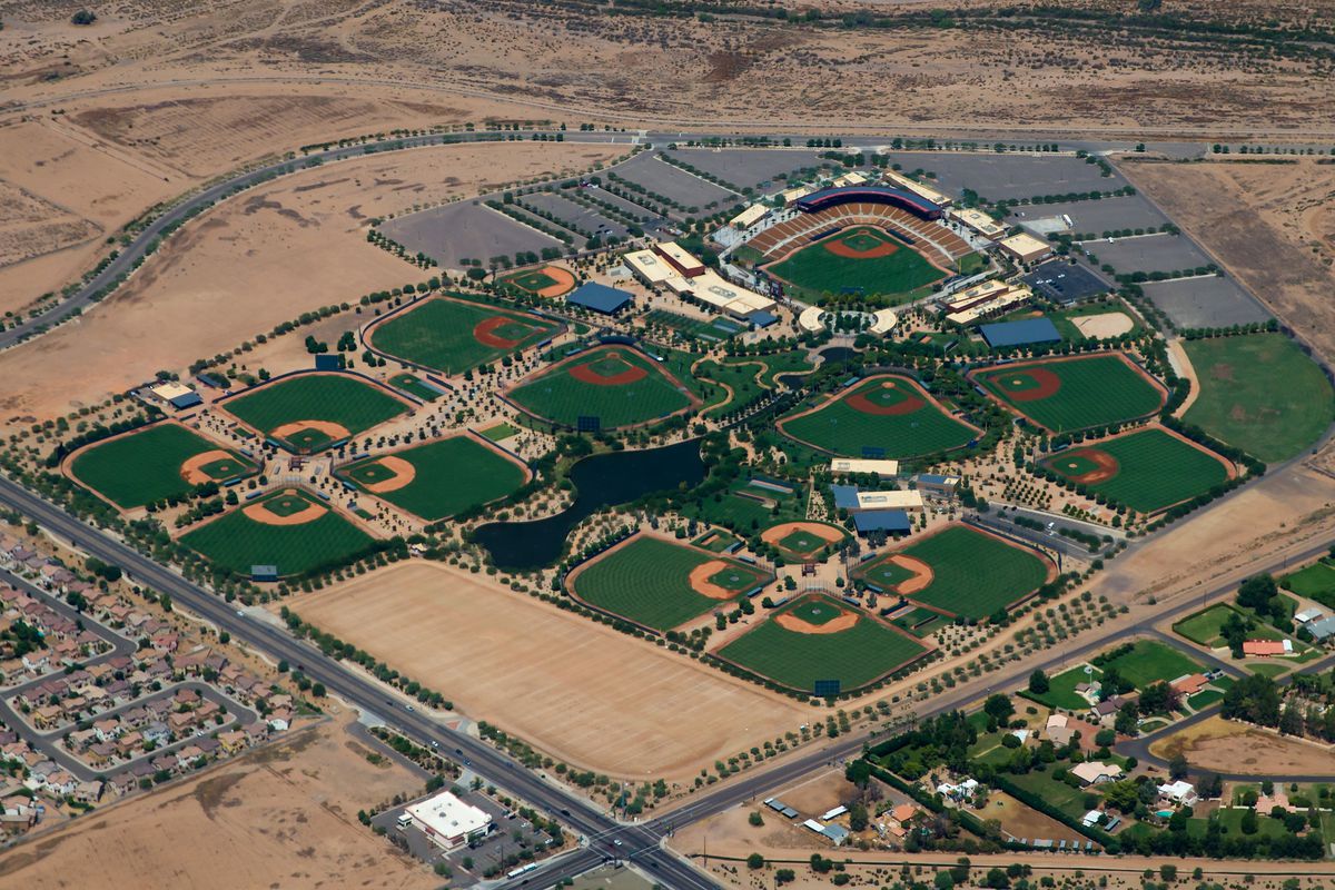 The two Dodgers minor league fields for games are the two fields at the farthest right and bottom of this aerial view of Camelback Ranch (both backing into the dirt parking lot).