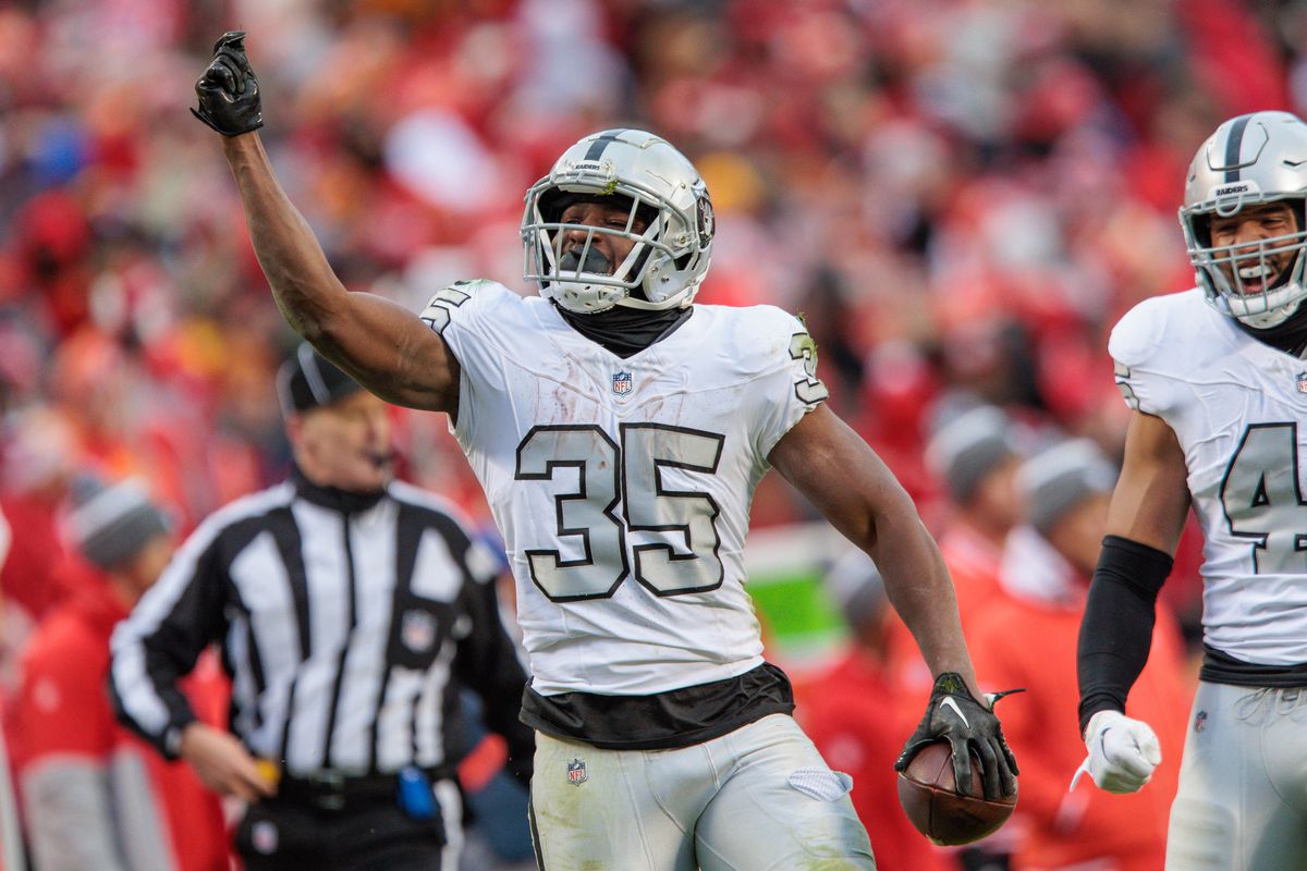 Las Vegas Raiders running back Zamir White (35) reacts after a play during the second half against the Kansas City Chiefs on December 25th, 2023 at Arrowhead Stadium in Kansas City, Missouri.