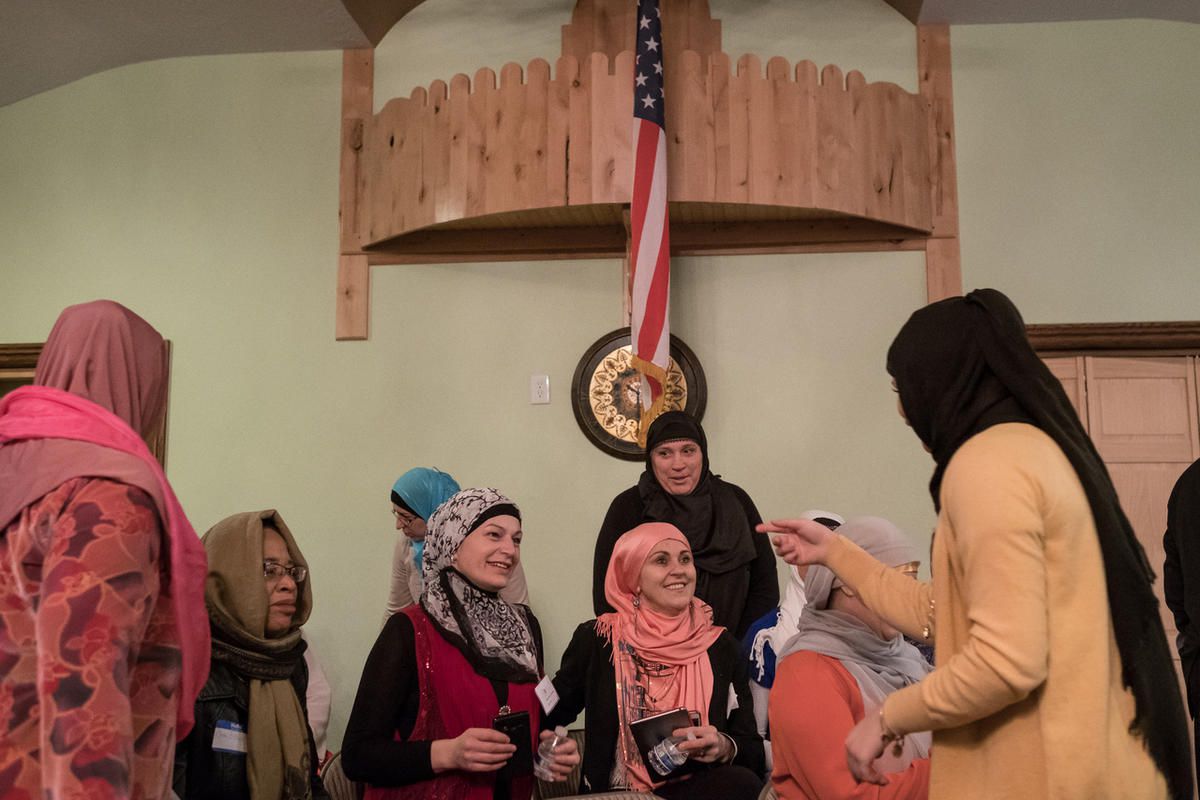 FILE: Woman gather and chat before a ceremony marking the completion of renovations of the Islamic Society of Bosniaks mosque in Salt Lake City on Saturday, Dec. 10, 2016. The mosque, which serves the area's Bosnian Muslim community, is named Maryam after