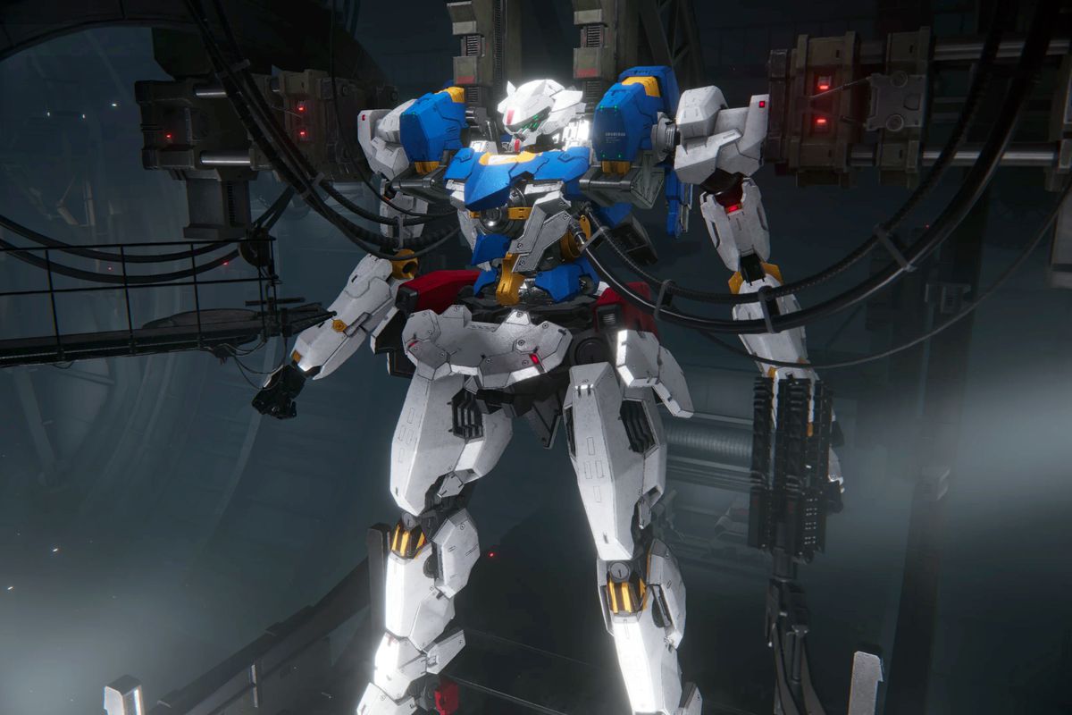 A Gundam-inspired AC mech in the garage of Armored Core 6: Fires of Rubicon