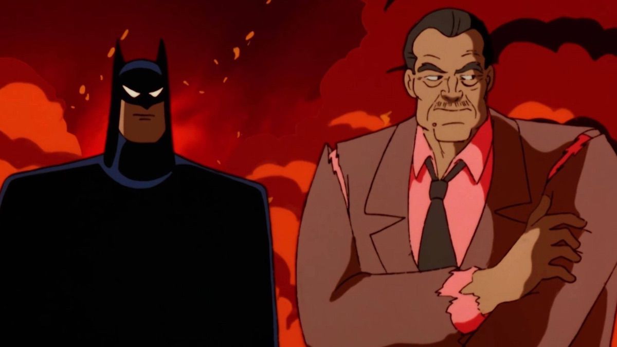 Rupert Thorne (R) standing beside Batman (L) in a torn jacket in front of a fiery plume of smoke in “It’s Never Too Late” from Batman: The Animated Series.