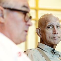 Gordon Chamberlain, left, looks at Martin McMahon, a cancer researcher at the Huntsman Cancer Institute and professor of dermatology at the University of Utah, as he discusses a new treatment for pancreatic cancer and the opening of a clinical trial at the institute in Salt Lake City on Monday, March 4, 2019. Chamberlain is taking part in a study.