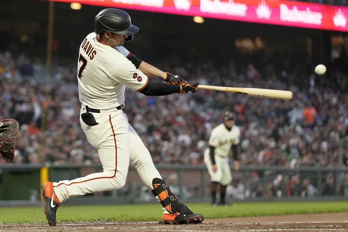 J.D. Davis of the San Francisco Giants hits a bases loaded two-run RBI double against the Arizona Diamondbacks in the bottom of the six inning at Oracle Park on August 02, 2023 in San Francisco, California.
