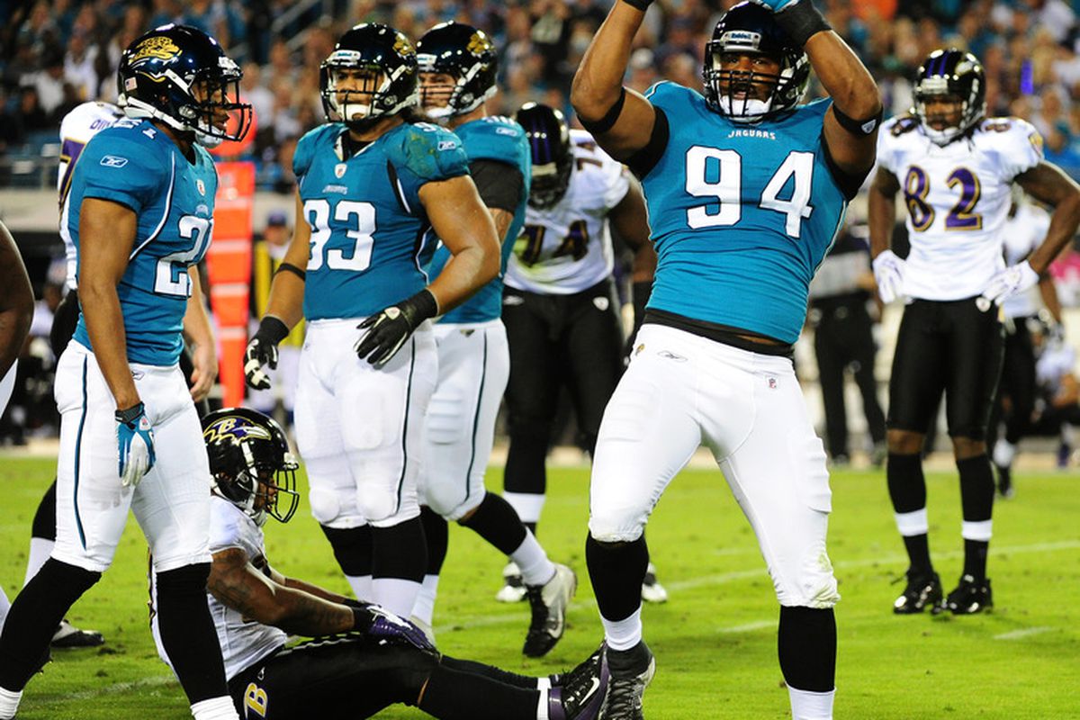 JACKSONVILLE, FL - OCTOBER 24: Jeremy Mincey #94 of the Jacksonville Jaguars celebrates after a tackle against the Baltimore Ravens at EverBank Field on October 24, 2011 in Jacksonville, Florida. (Photo by Scott Cunningham/Getty Images)