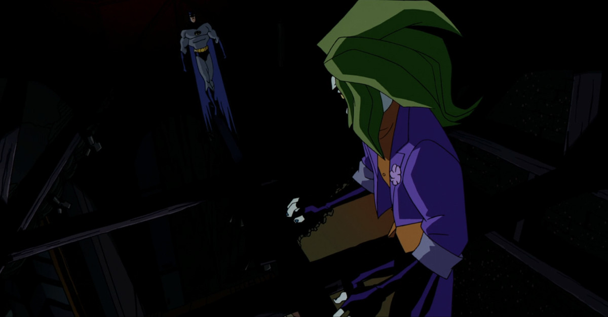 Batman walking along a beam to the Joker (in the foreground) who’s standing in an anime crouch waiting