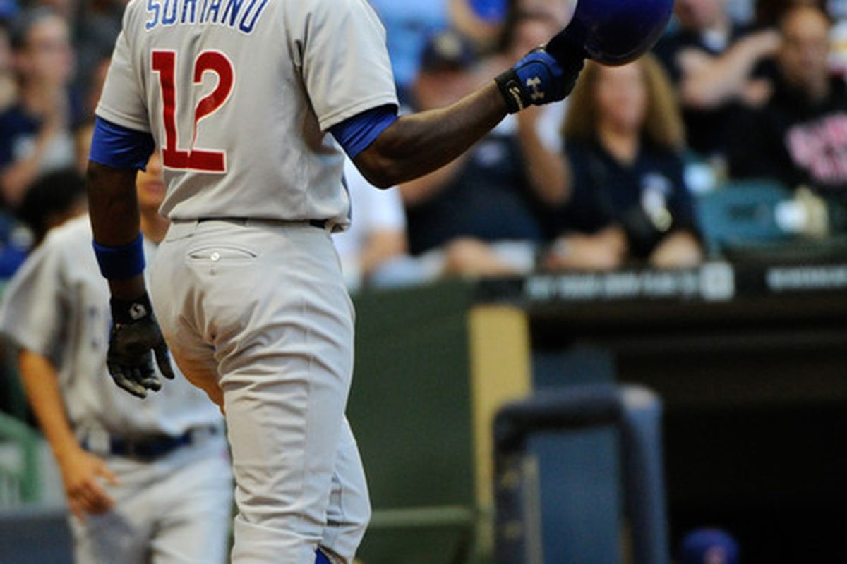 Milwaukee, WI, USA; Chicago Cubs left fielder Alfonso Soriano heads back to the dugout after striking out against the Milwaukee Brewers at Miller Park. Credit: Benny Sieu-US PRESSWIRE