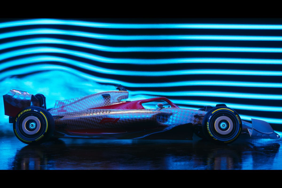 side view of a formula one race car in an aerodynamic wind tunnel test