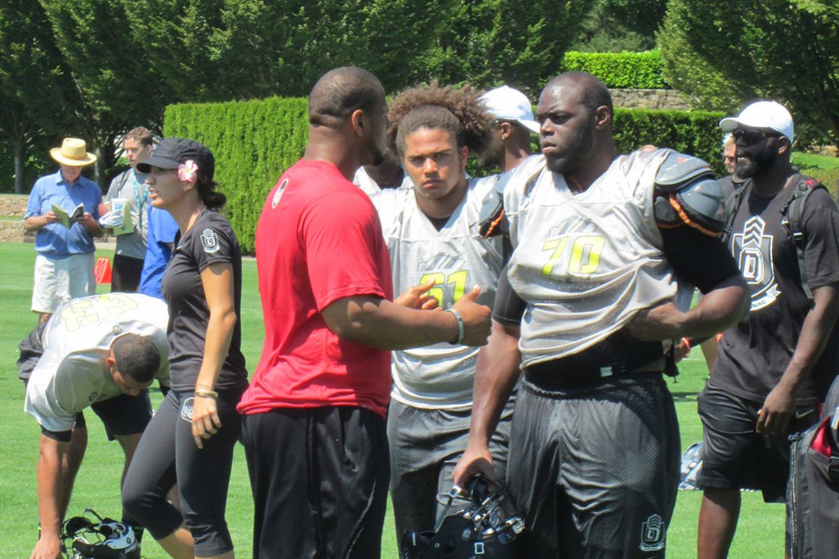 A'Shawn Robinson (right) learned from the best at The Opening