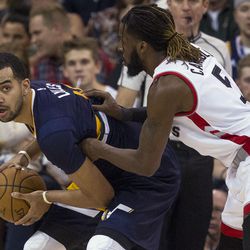 Utah forward Trey Lyles (41) controls the ball against Toronto forward DeMarre Carroll (5) during an NBA basketball game in Salt Lake City on Friday, Dec. 23, 2016. Toronto took down Utah with a final score of 104-98.