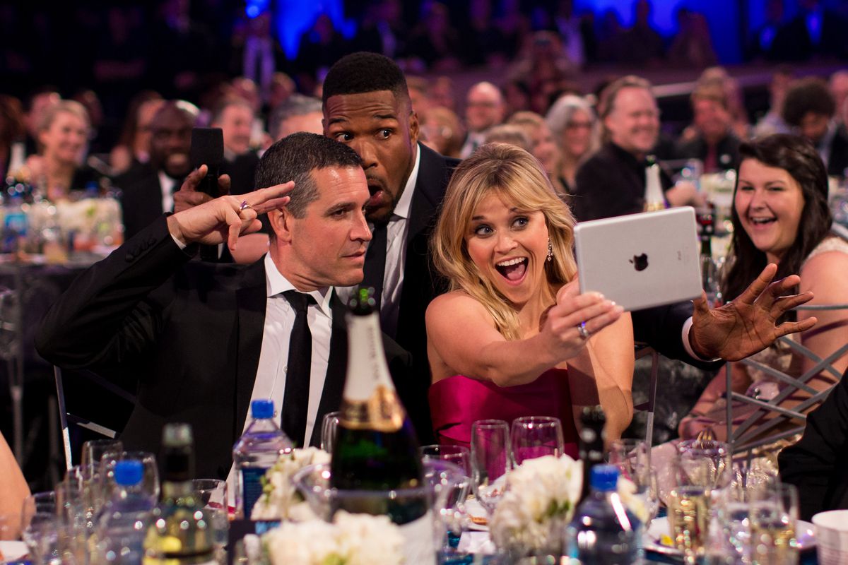 Reese Witherspoon is still excited about iPads.