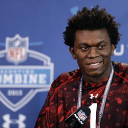Brigham Young defensive lineman Ziggy Ansah answers a question during a news conference at the NFL football scouting combine in Indianapolis on Feb. 23, 2013.