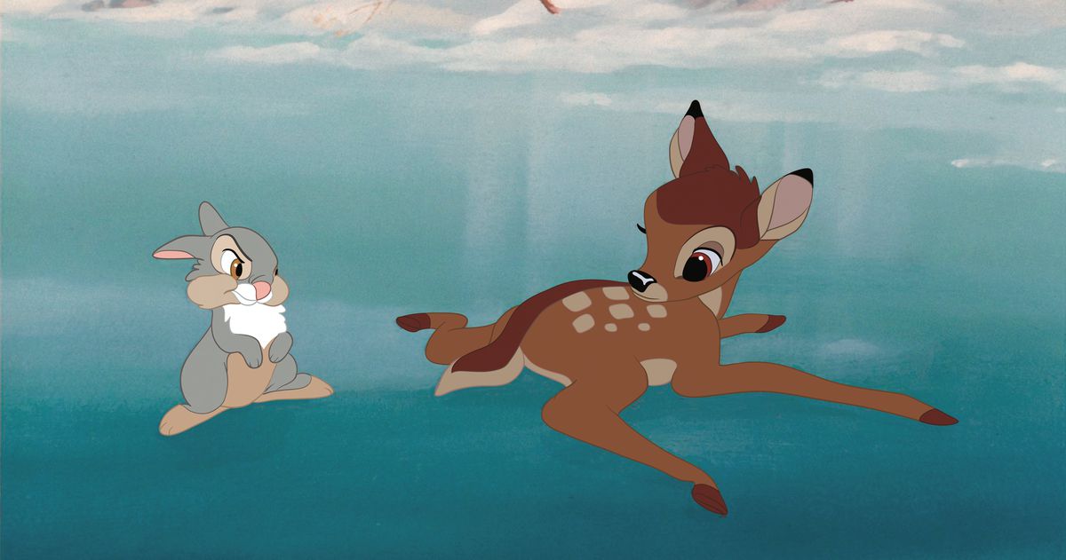 Thumper, a small gray rabbit, looks with some frustration at Bambi, a fawn, who’s splayed out awkwardly on the surface of an icy pond in Disney’s Bambi
