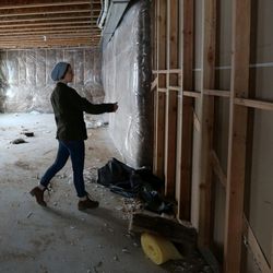 Gentry Holbrook walks through the house she and her husband, Ryan, are having built in North Salt Lake on Tuesday, Dec. 29, 2015. 
