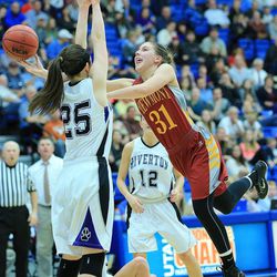 Riverton's Rebecca McDougal defends Viewmont's Katie Toole Wednesday, Feb. 18, 2015, in 5A State quarterfinal action at Salt Lake Community College in Taylorsville.