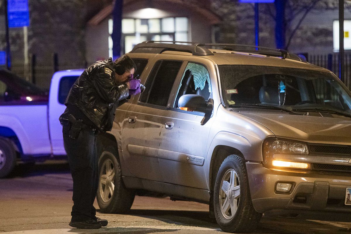 Chicago police investigate a man shot, Monday night in the 2600 block of South Spaulding, in the Little Village neighborhood. | Tyler LaRiviere/Sun-Times