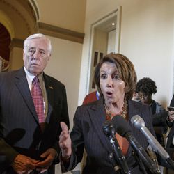 In this Feb. 27, 2015, photo, House Democratic Leader Nancy Pelosi of Calif., accompanied by House Minority Whip Steny Hoyer of Md., voice their objections to the Republican majority during a delay in voting for a short-term spending bill for the Homeland Security Department during a news conference on Capitol Hill in Washington. 