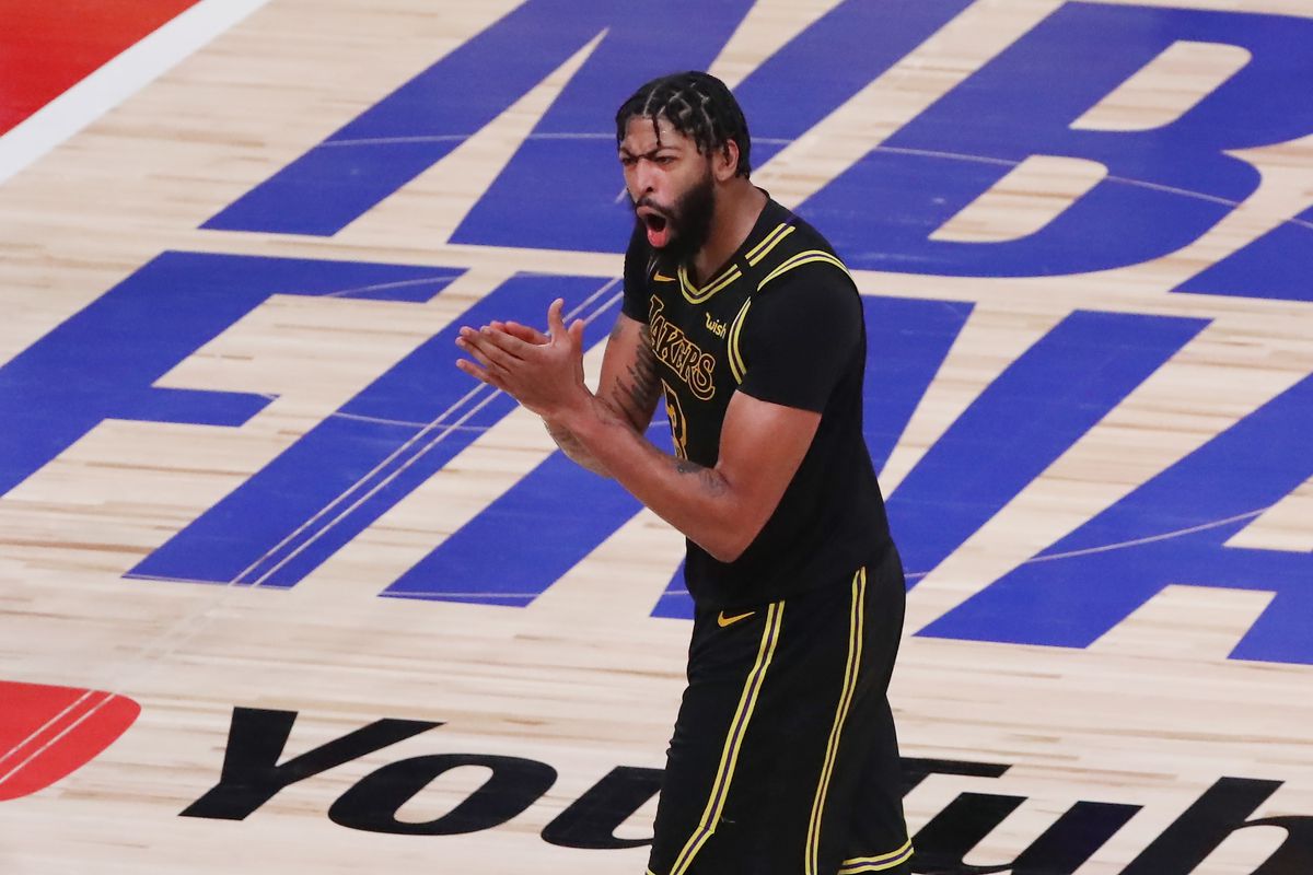 Anthony Davis of the Los Angeles Lakers reacts during the fourth quarter against the Miami Heat in Game Five of the 2020 NBA Finals at AdventHealth Arena at the ESPN Wide World Of Sports Complex on October 9, 2020 in Lake Buena Vista, Florida.