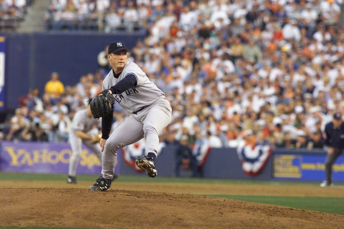 New York Yankees’ David Cone pitching in the second inning d