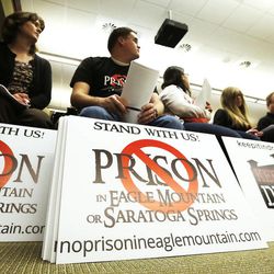 Audience members listen as the Prison Relocation Commission meets to discuss potential sites for a relocated correctional facility during the Utah Legislature in Salt Lake City Friday, Feb. 27, 2015. 