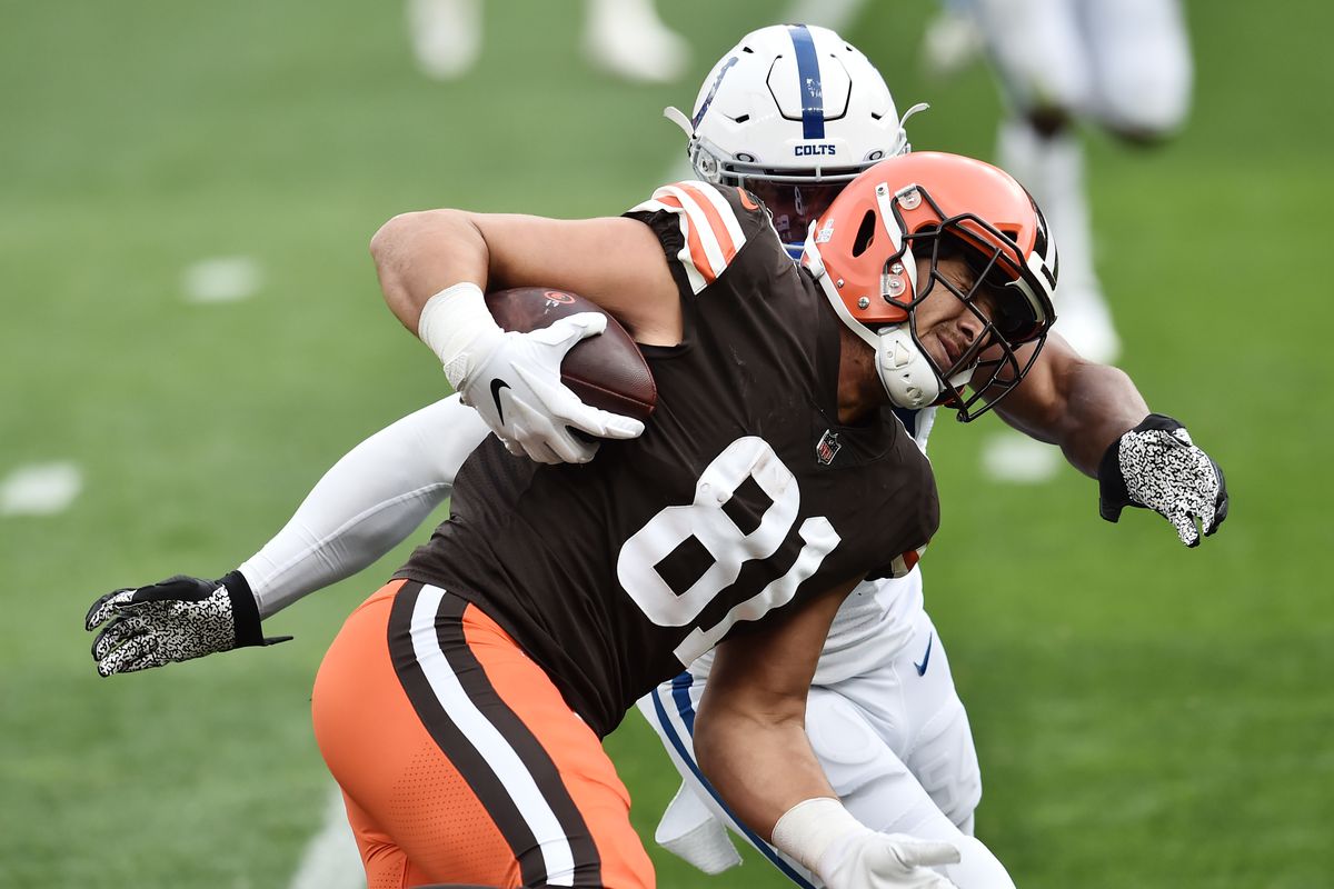 Browns tight end Austin Hooper (81) is tackled by Indianapolis Colts middle linebacker Anthony Walker (54) during the first quarter at FirstEnergy Stadium.