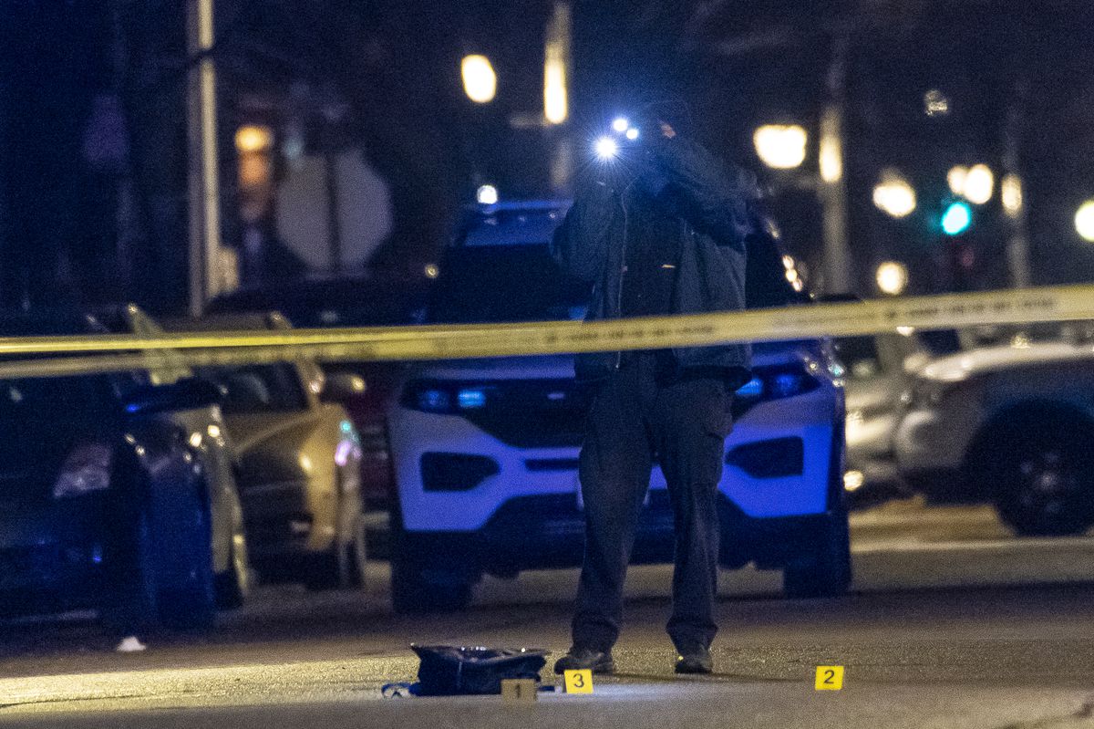 Chicago police work the scene where a 14-year-old boy was shot and killed in the 2200 block of W. Adams St. on the Near West Side, Wednesday, Jan. 12, 2021.