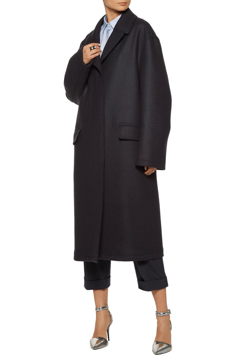 A model in a navy wool coat