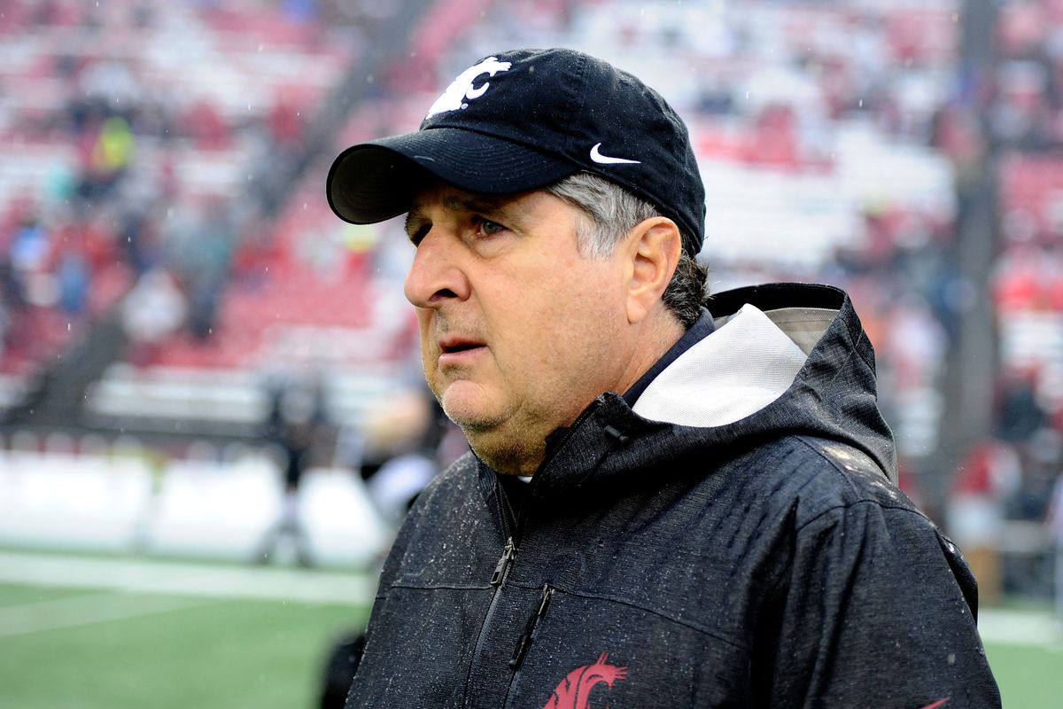 Washington State Cougars head coach Mike Leach walks out onto the field before a football game against the Colorado Buffaloes at Martin Stadium.