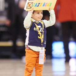 A Jazz fan holds an election sign during NBA action in Salt Lake City on Friday, Nov. 4, 2016. The Spurs won 100-86.