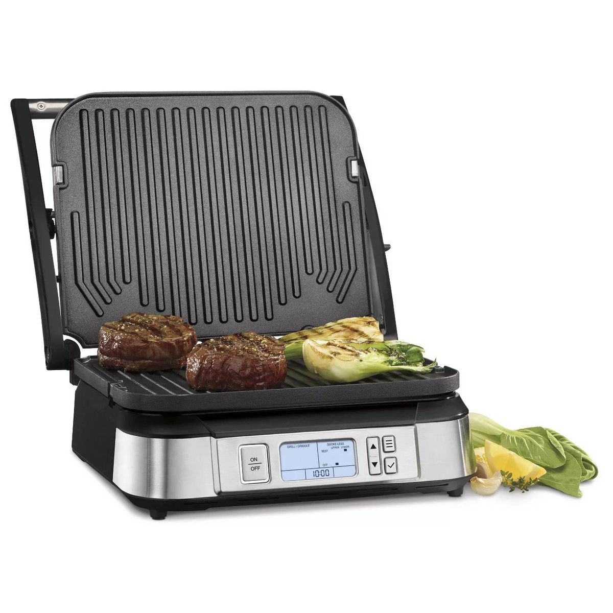 A panini press, open and cooking a couple burgers and vegetables