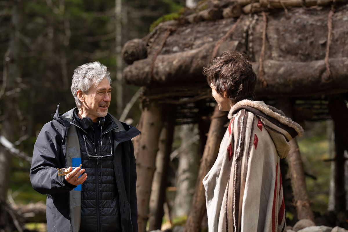 Andor creator Tony Gilroy speaks to Diego Luna on the set of the show.