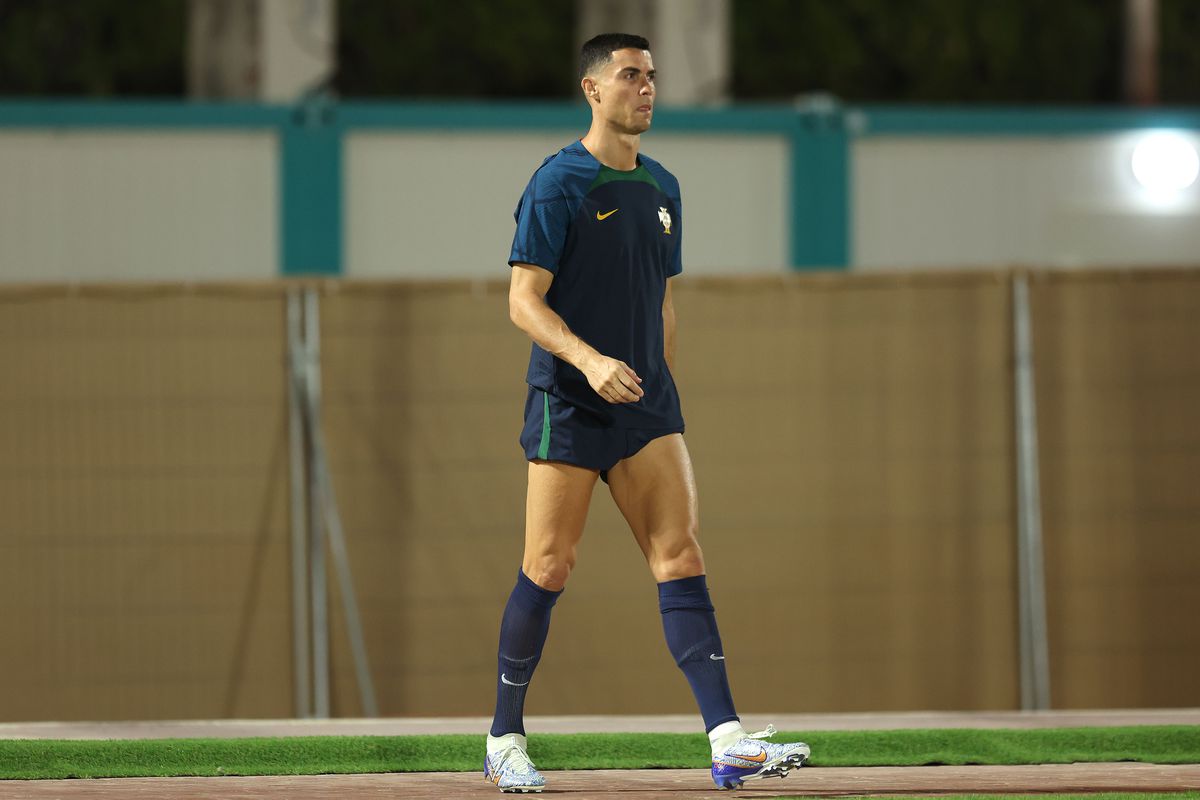 Cristiano Ronaldo of Portugal looks on during the Portugal Training Sesion on match day -1 at Al Shahaniya SC training site on December 05, 2022 in Doha, Qatar.