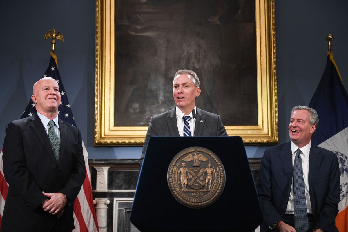 Former NYPD Commissioner James O’Neill (l.) looks on as Mayor Bill de Blasio announces Dermot Shea (c.) will be new head of NYPD. Nov. 4, 2019.