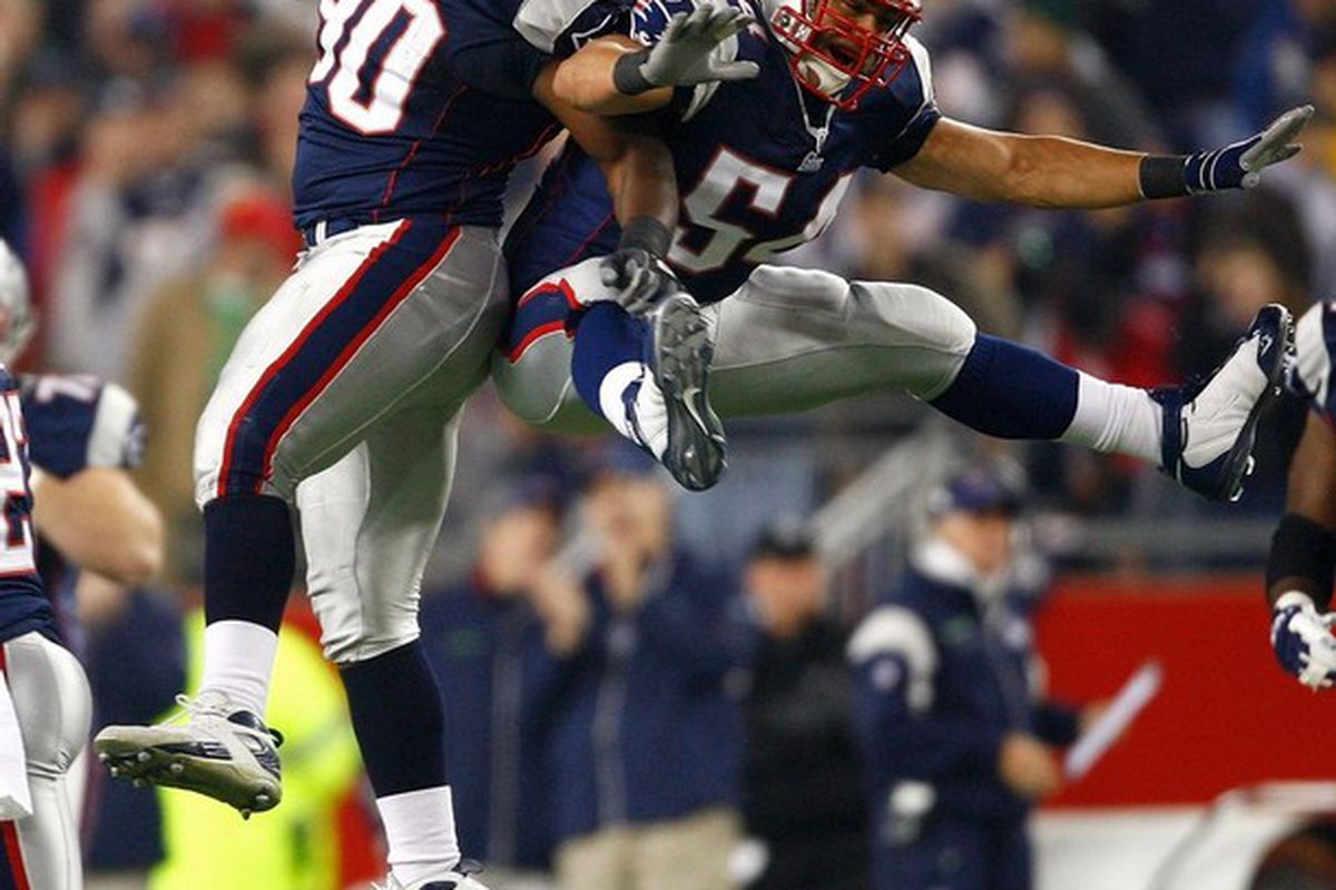 <em>Le Kevin Smith and Tedy Bruschi celebrate a fumble recovery against the Denver Broncos at Gillette Stadium last season.</em>