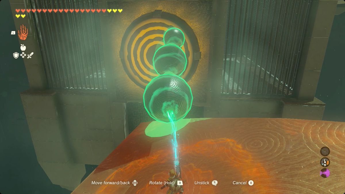 The Legend of Zelda: Tears of the Kingdom Link placing a stack of balls to fall against a target in Iun-orok Shrine