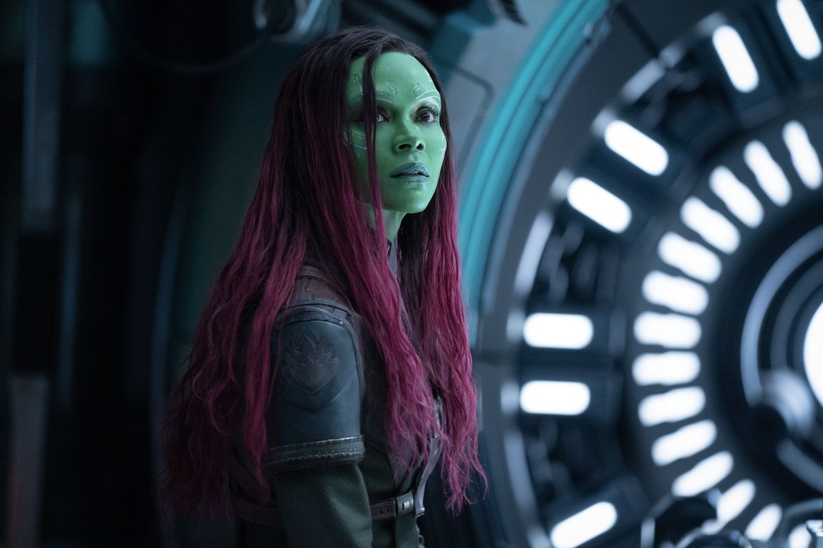 Gamora (Zoe Saldaña) looks apprehensively into the distance on a starship in Guardians of the Galaxy Vol. 3.