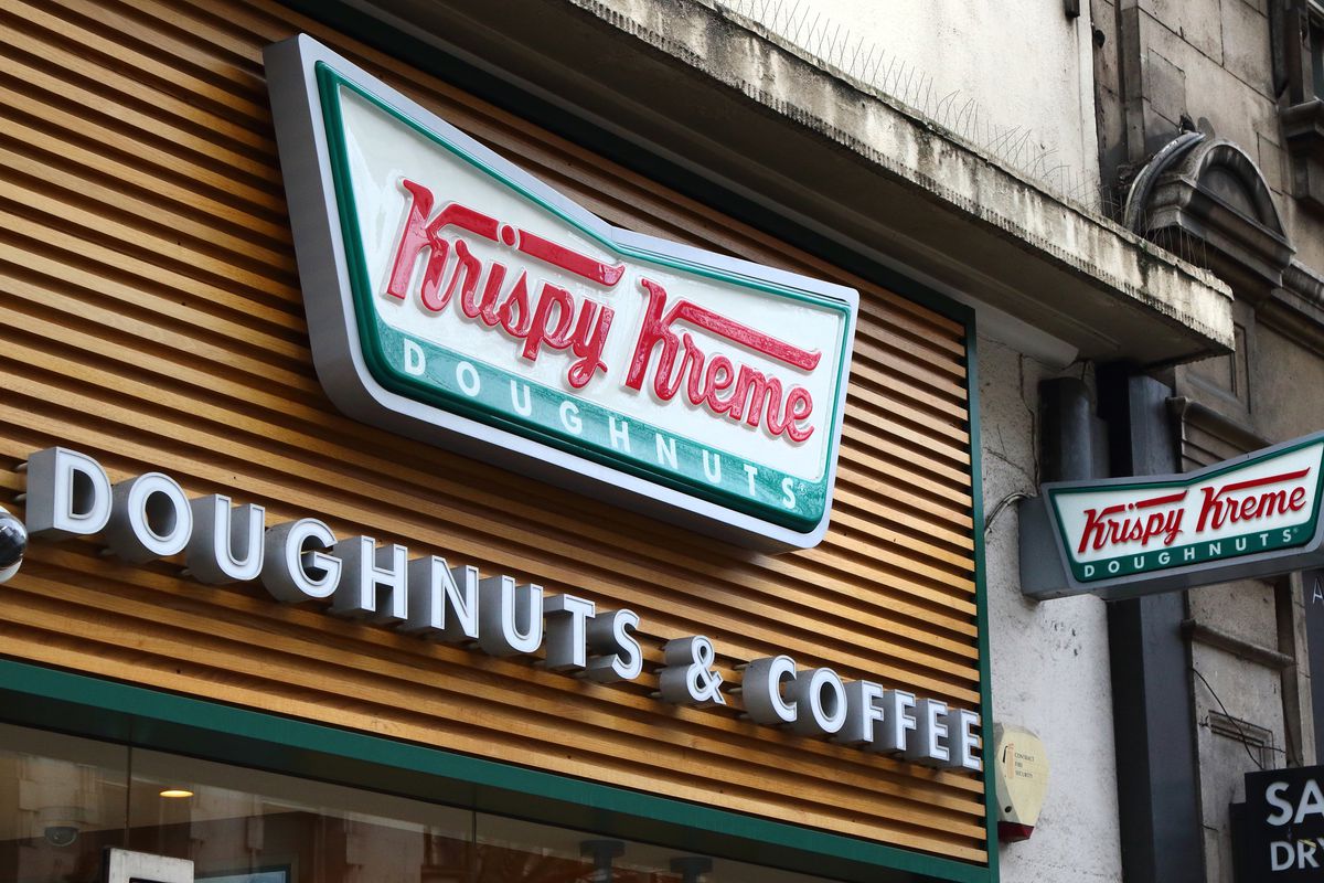 Krispy Kreme store and brand logo seen in London, UK.
