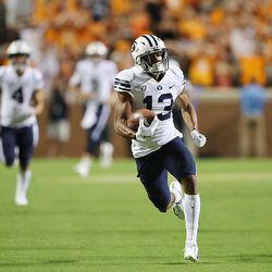 Brigham Young Cougars wide receiver Micah Simon (13) runs in the open field after making a catch, setting up the game-tying field goal, as BYU and Tennessee play a game in Knoxville on Saturday, Sept. 7, 2019. BYU won 29-26 in double overtime.