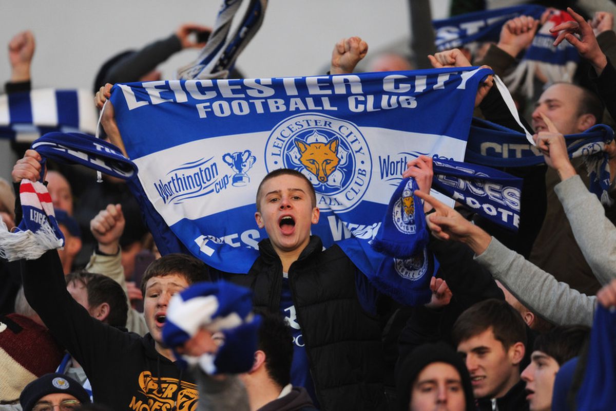 NORWICH, ENGLAND - FEBRUARY 18:  Leicester fans celebrate during the FA Cup Fifth Round match between Norwich City and Leicester City at Carrow Road on February 18, 2012 in Norwich, England.  (Photo by Michael Regan/Getty Images)
