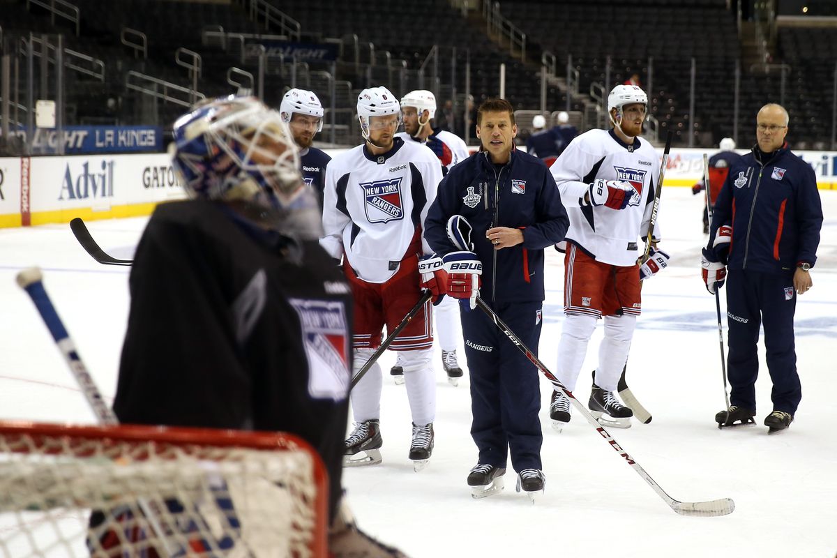 Ulf Samuelsson speaks to the Rangers in practice during the Stanley Cup Final
