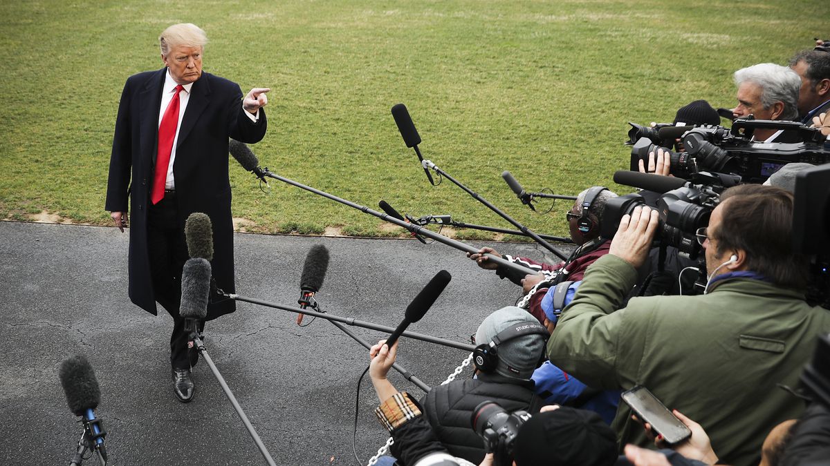 President Trump talks to reporters before departing the White House on March 22, 2019.