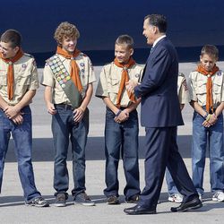 Mitt Romney greets Boy Scouts from Salt Lake City Troop 315 as he arrives in Salt Lake City, Tuesday, Sept. 18, 2012.