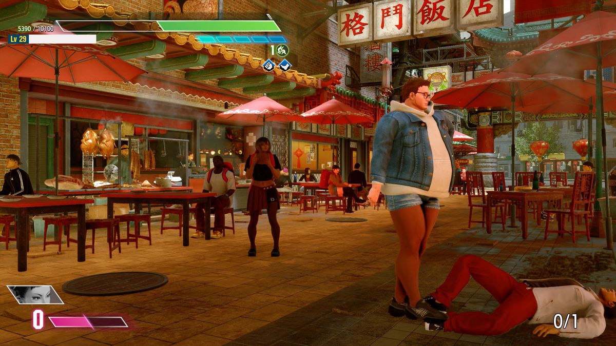 The writer’s Street Fighter 6 character, rocking red tights and jean shorts, standing over a defeated opponent at the end of a match