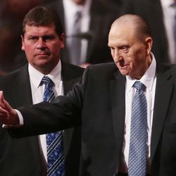 President Thomas S. Monson gestures to attendees after the Saturday morning session of 185th Annual General Conference for The Church of Jesus Christ of Latter-day Saints in Salt Lake City Saturday, April 4, 2015.