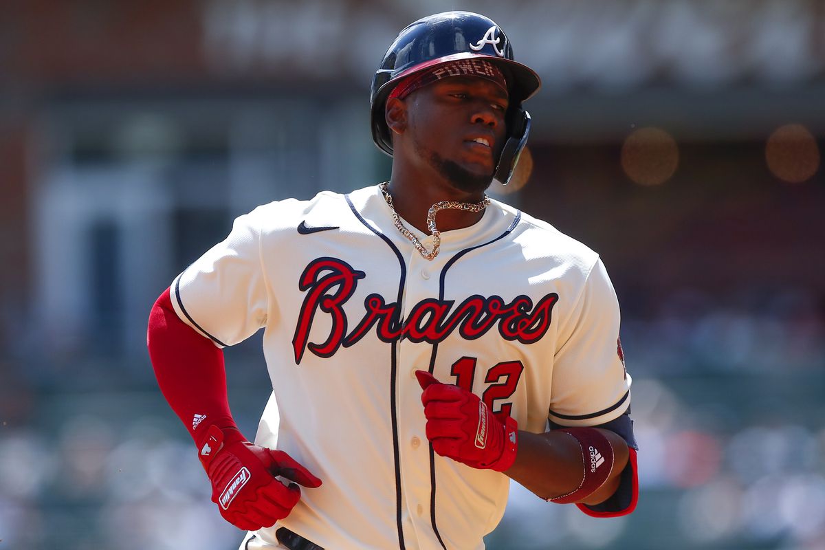 Jorge Soler #12 of the Atlanta Braves rounds third after hitting a home run in the fourth inning of an MLB game against the San Francisco Giants at Truist Park on August 29, 2021 in Atlanta, Georgia.
