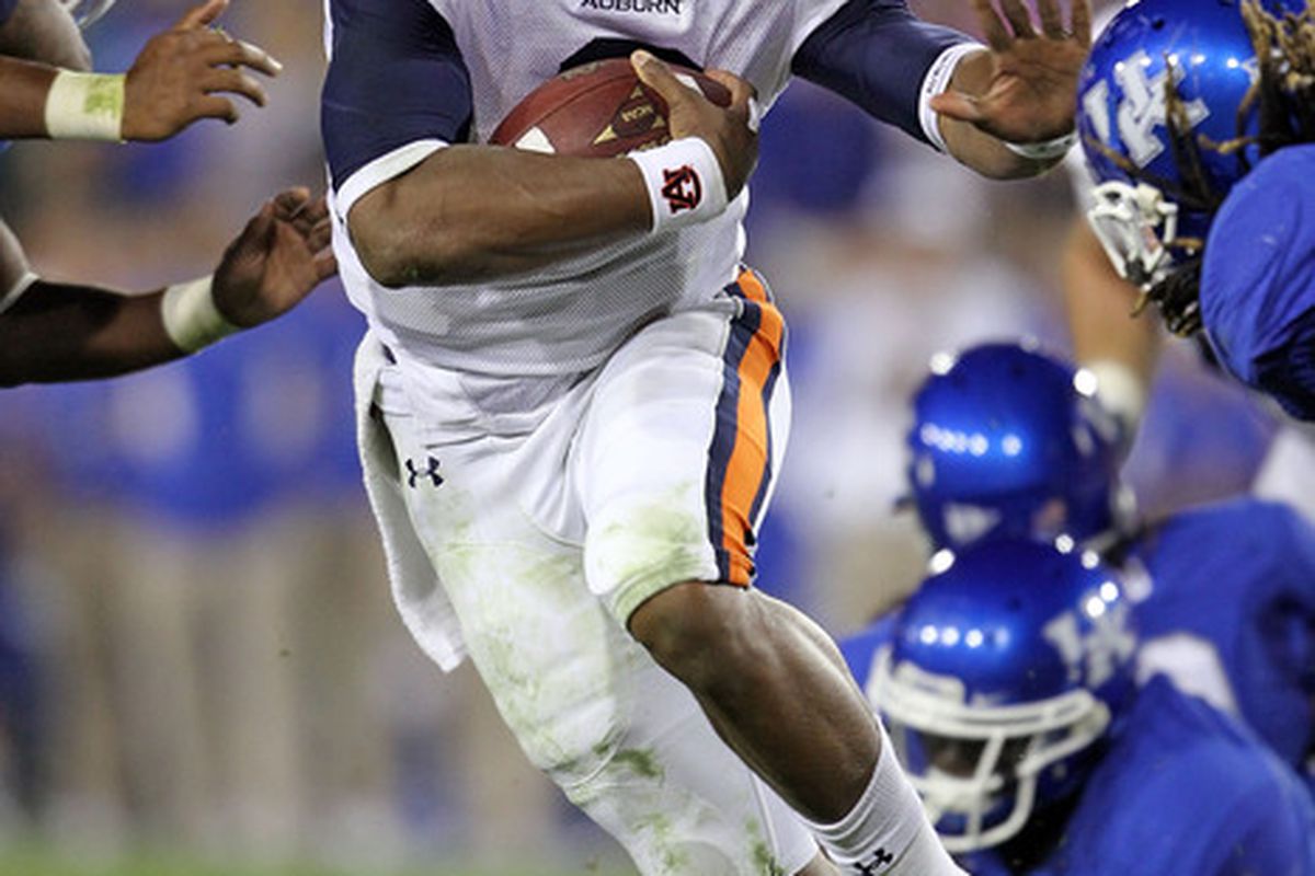 LEXINGTON, KY - OCTOBER 09:  Cam Newton #2 of the Auburn Tigers runs with the ball during the SEC game against the Kentucky Wildcats at Commonwealth Stadium on October 9, 2010 in Lexington, Kentucky.  (Photo by Andy Lyons/Getty Images)