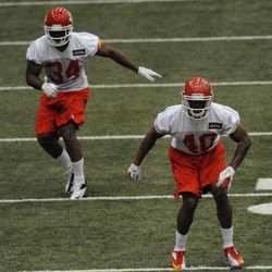Kansas City Chiefs defensive backs Sanders Commings (34) Durrell Givens (40) run drills during the rookie mini camp at the University of Kansas Hospital Training Complex. 