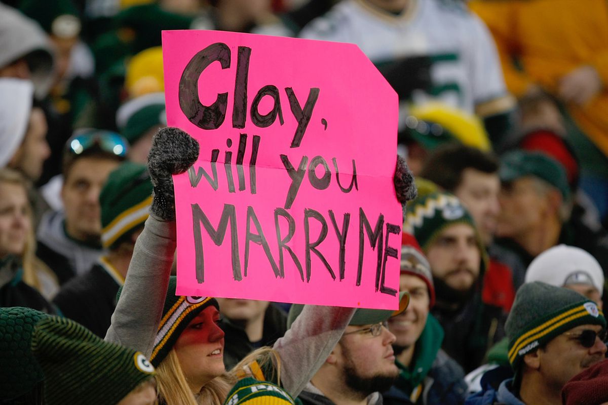 GREEN BAY, WI - DECEMBER 11: A fan holds up a sign intended for Clay Matthews #52 of the Green Bay Packers during the game against the Oakland Raiders at Lambeau Field on December 11, 2011 in Green Bay, Wisconsin. (Photo by Scott Boehm/Getty Images)
